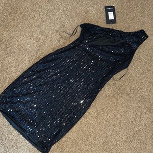 Black sequin over shoulder dress